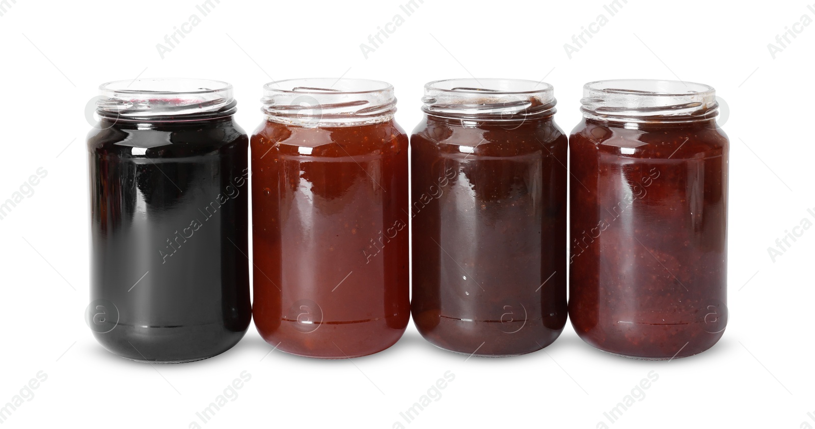 Different sweet jams in jars isolated on white Photo of Different sweet jams in jars isolated on white