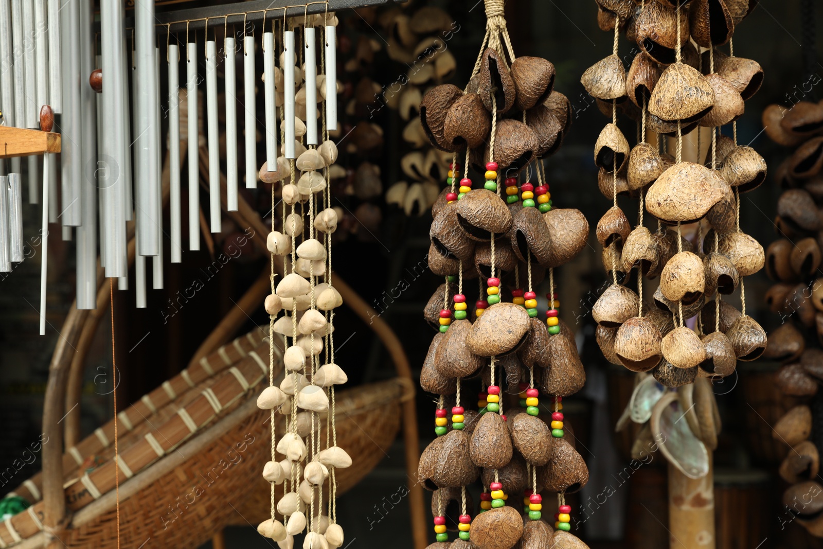 Different wind chimes in outdoor souvenir shop Photo of Different wind chimes in outdoor souvenir shop
