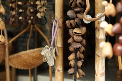Photo of Different wind chimes in outdoor souvenir shop