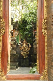 Photo of Bali, Indonesia - May 15, 2025: Beautiful sculpture of Ganesha outdoors