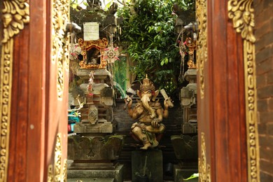 Photo of Bali, Indonesia - May 15, 2025: Beautiful sculpture of Ganesha outdoors
