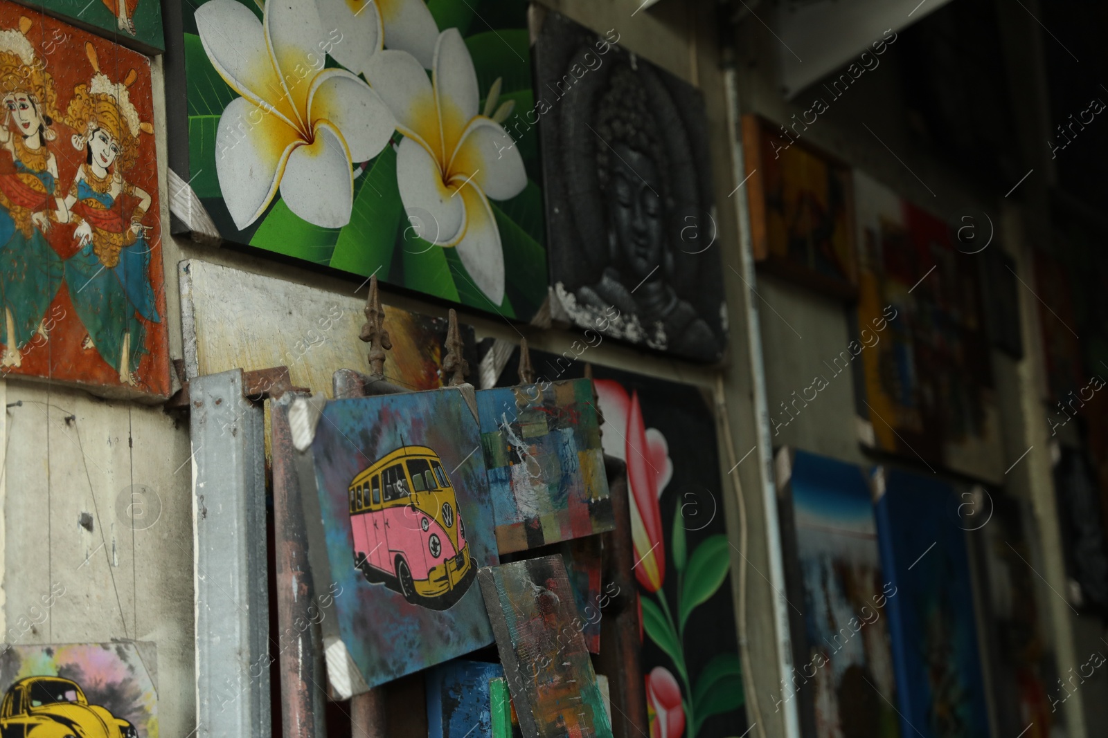 Bali, Indonesia - May 15, 2025: Different pictures on wall indoors, closeup Photo of Bali, Indonesia - May 15, 2025: Different pictures on wall indoors, closeup