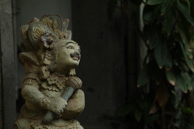 Photo of Bali, Indonesia - May 15, 2025: Beautiful ancient sculpture outdoors, space for text