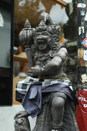 Photo of Bali, Indonesia - May 15, 2025: Beautiful ancient sculpture outdoors