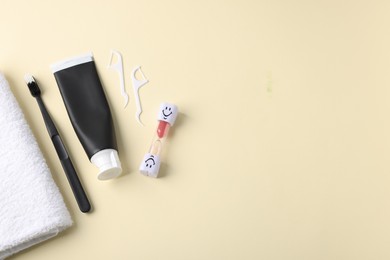 Photo of Different oral care products on beige background, flat lay. Space for text