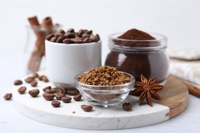 Photo of Different types of instant coffee, beans and spices on light table, closeup