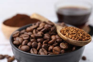 Photo of Roasted beans and granulated instant coffee on light table, closeup