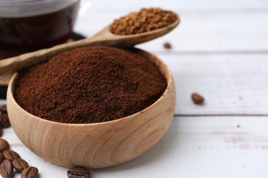 Photo of Different types of instant coffee and beans on white wooden table, closeup