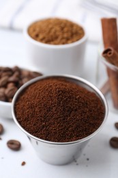 Photo of Instant coffee powder on light table, closeup