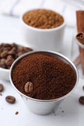 Photo of Instant coffee powder on light table, closeup