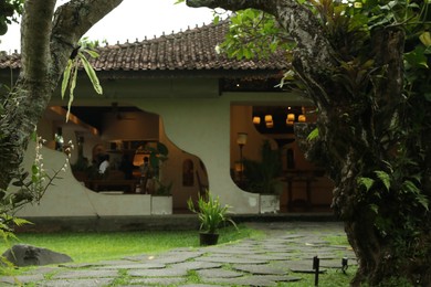 Photo of View of hotel restaurant and different plants
