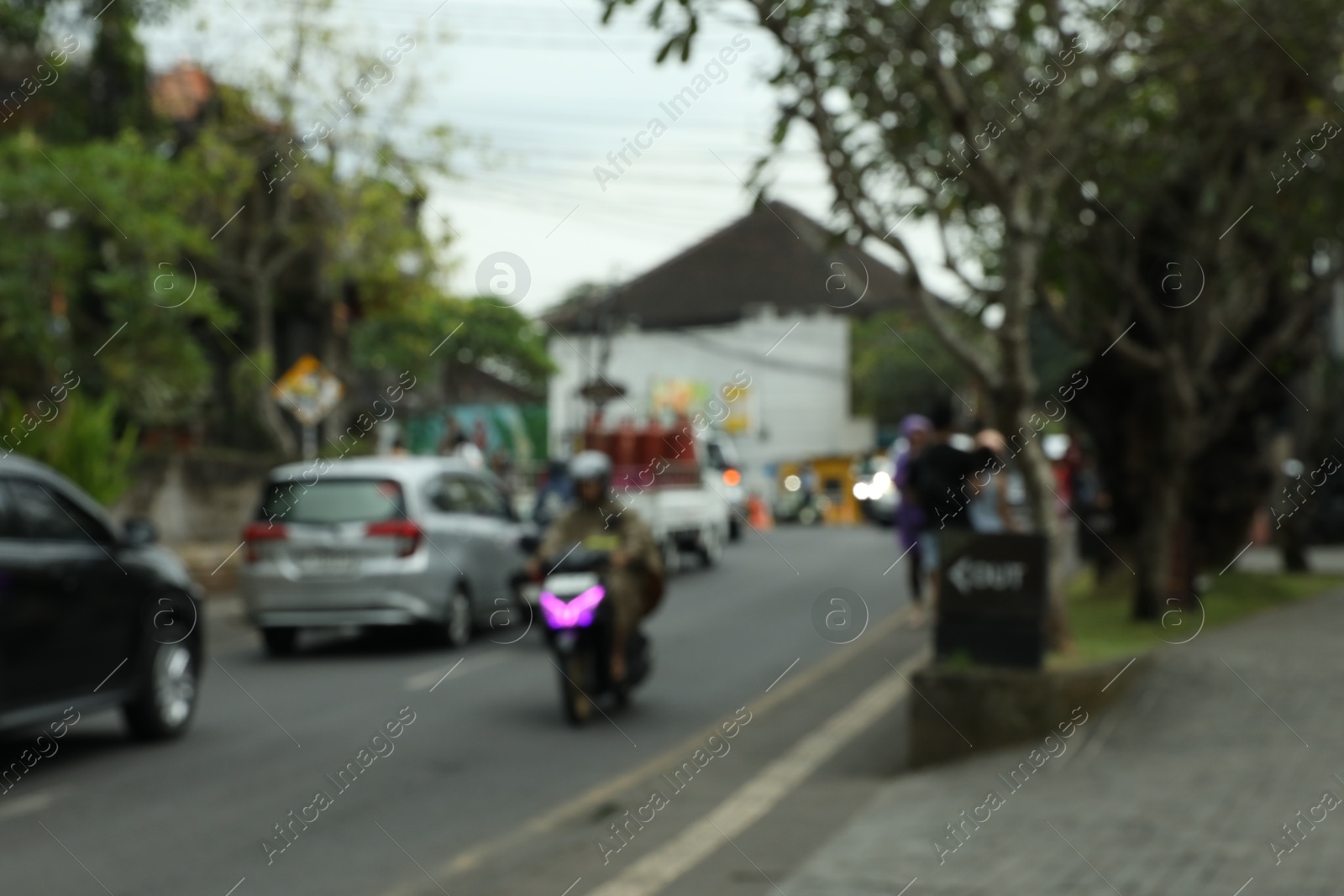 Photo of Blurred view of busy road in city