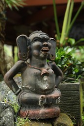 Photo of Bali, Indonesia - May 22, 2025: Dvarapala (gate guardian) statue outdoors