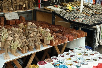 Photo of Bali, Indonesia - May 25, 2025: Display with different souvenirs at local gift shop