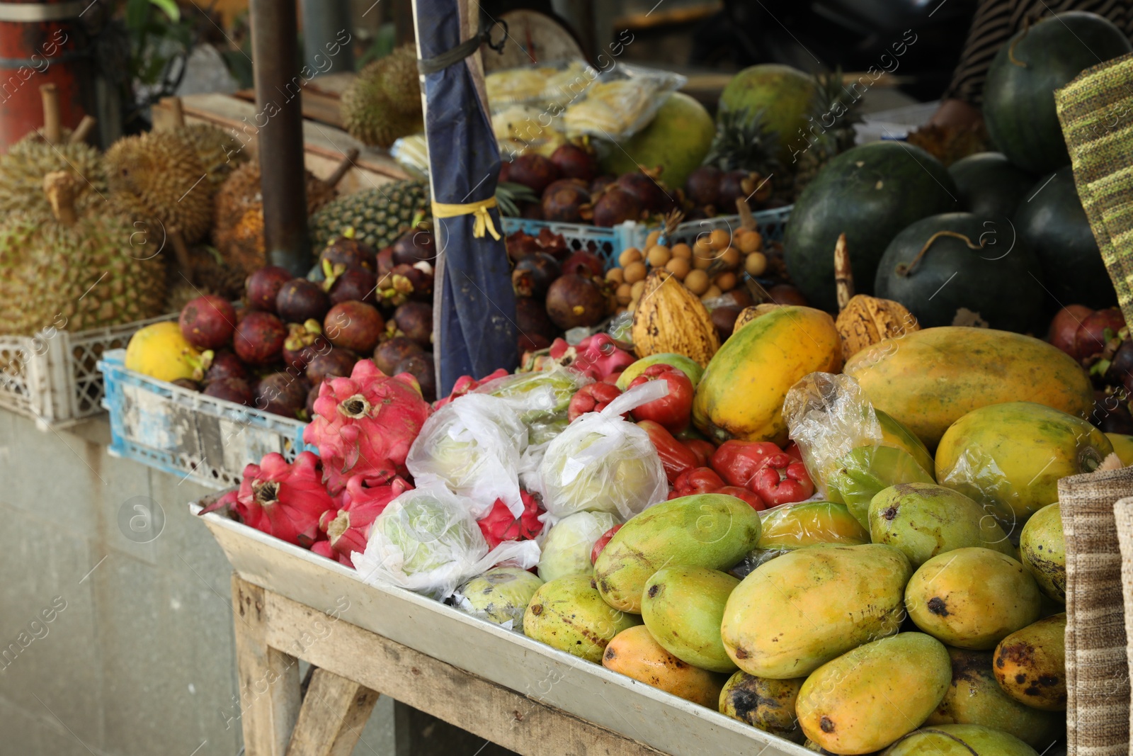 Different fresh ripe fruits at market, closeup Photo of Different fresh ripe fruits at market, closeup