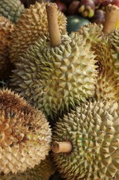 Photo of Fresh ripe durians at market, above view