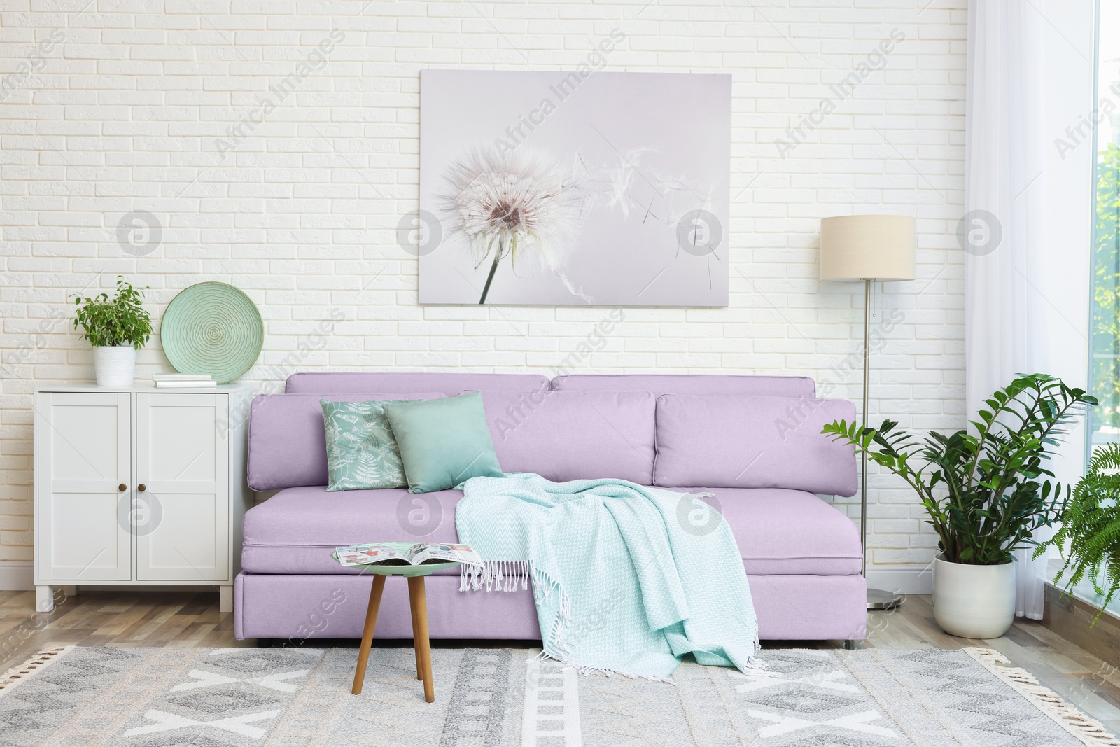 Stylish living room with comfortable sofa and other furniture. Interior design Image of Stylish living room with comfortable sofa and other furniture. Interior design