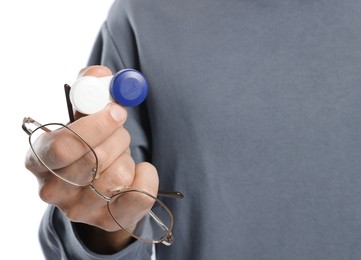 Photo of Man with glasses and contact lenses on white background, closeup
