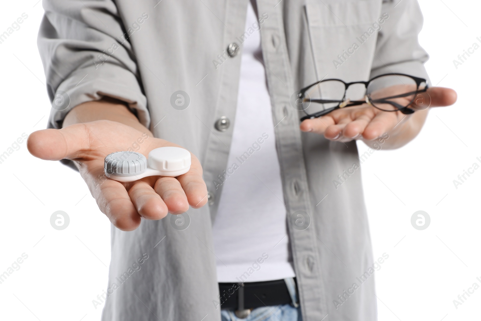 Man choosing between glasses and contact lenses on white background, closeup Photo of Man choosing between glasses and contact lenses on white background, closeup