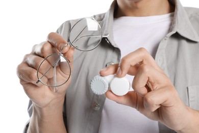 Photo of Man with glasses and contact lenses on white background, closeup