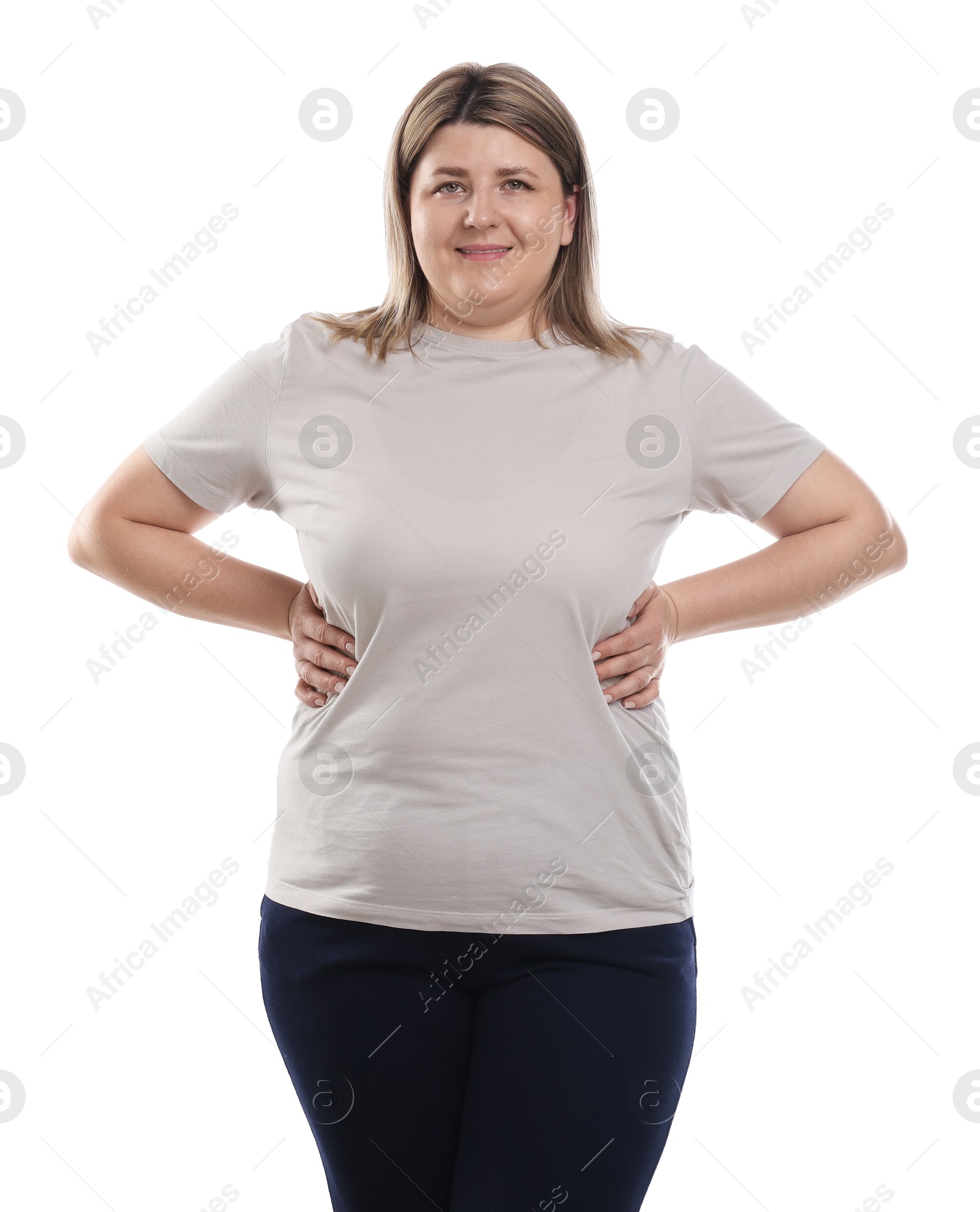 Weight loss. Plus size woman on white background Photo of Weight loss. Plus size woman on white background