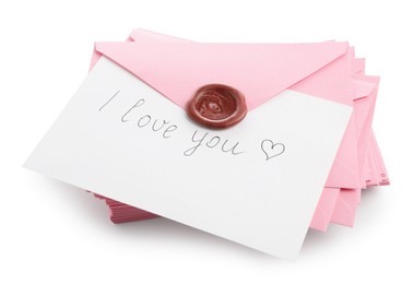 Photo of Stack of letters and paper with words I Love You isolated on white