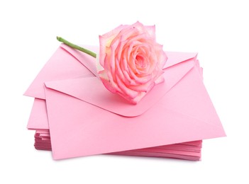 Photo of Stack of love letters and flower isolated on white