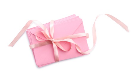 Photo of Stack of love letters with ribbon isolated on white, top view