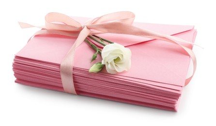 Photo of Stack of love letters and flower isolated on white