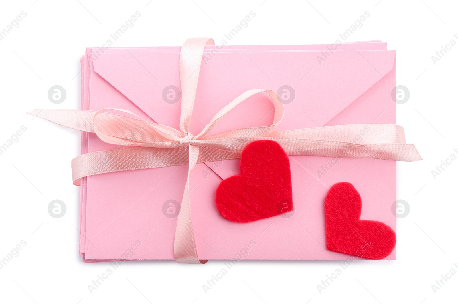 Stack of love letters and paper hearts isolated on white, top view Photo of Stack of love letters and paper hearts isolated on white, top view