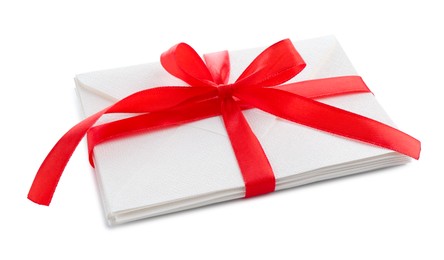 Photo of Stack of love letters with ribbon isolated on white