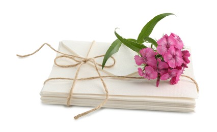 Photo of Stack of love letters and flower isolated on white