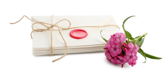 Photo of Stack of love letters and flower isolated on white