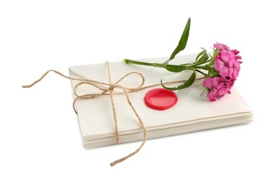 Photo of Stack of love letters and flower isolated on white
