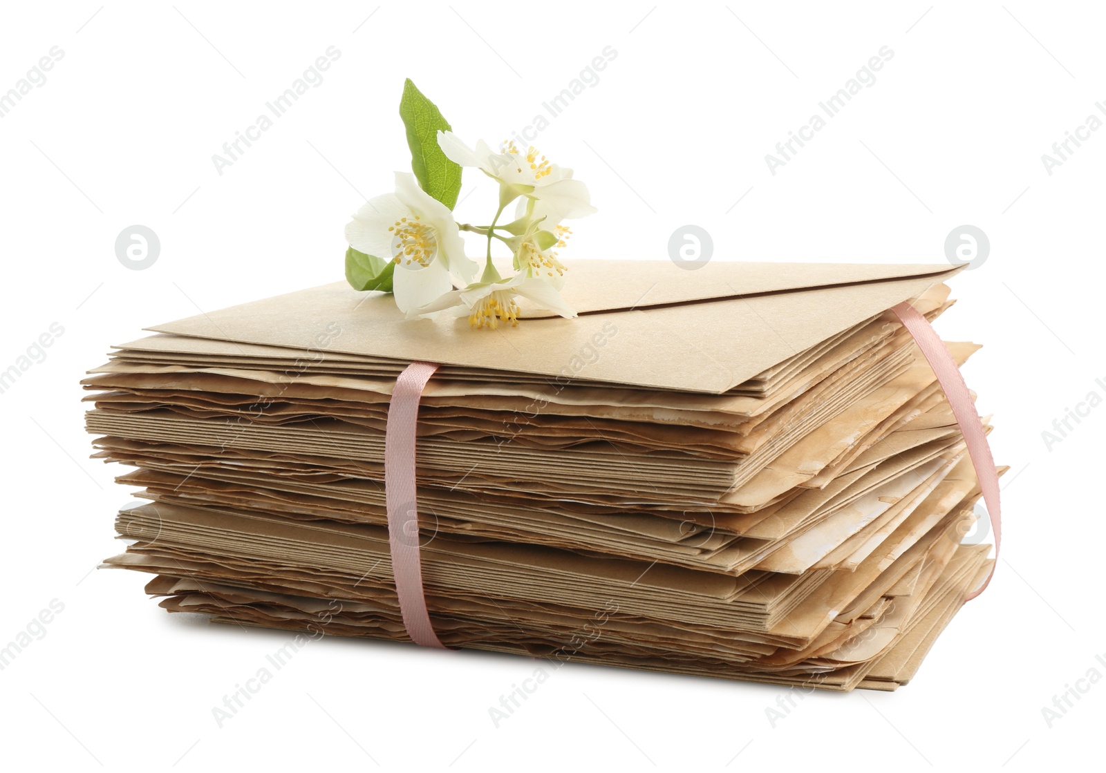 Photo of Stack of love letters and flowers isolated on white