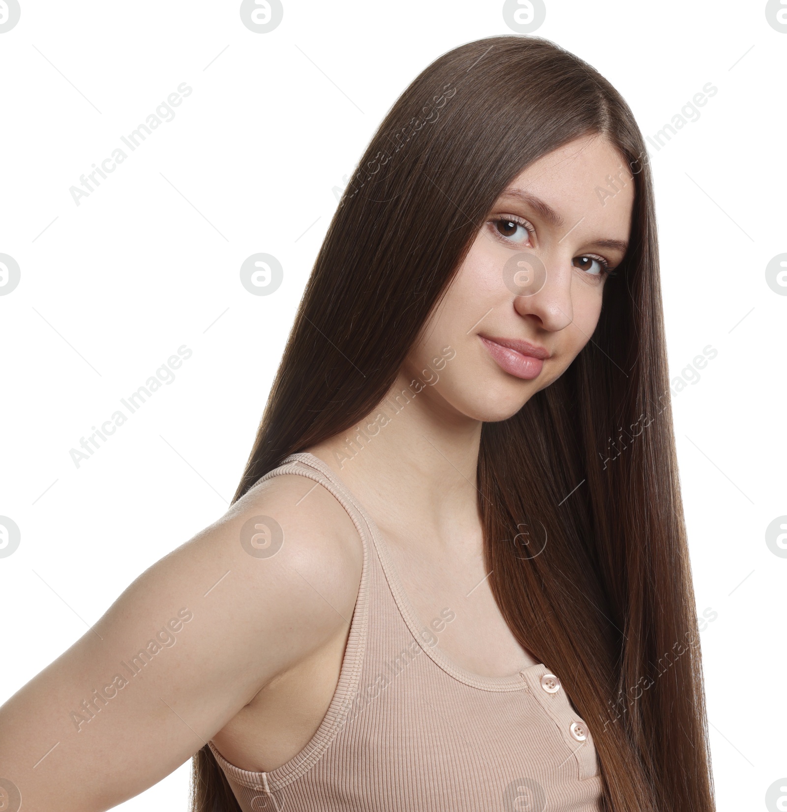 Portrait of beautiful teenage girl with healthy long hair on white background Photo of Portrait of beautiful teenage girl with healthy long hair on white background