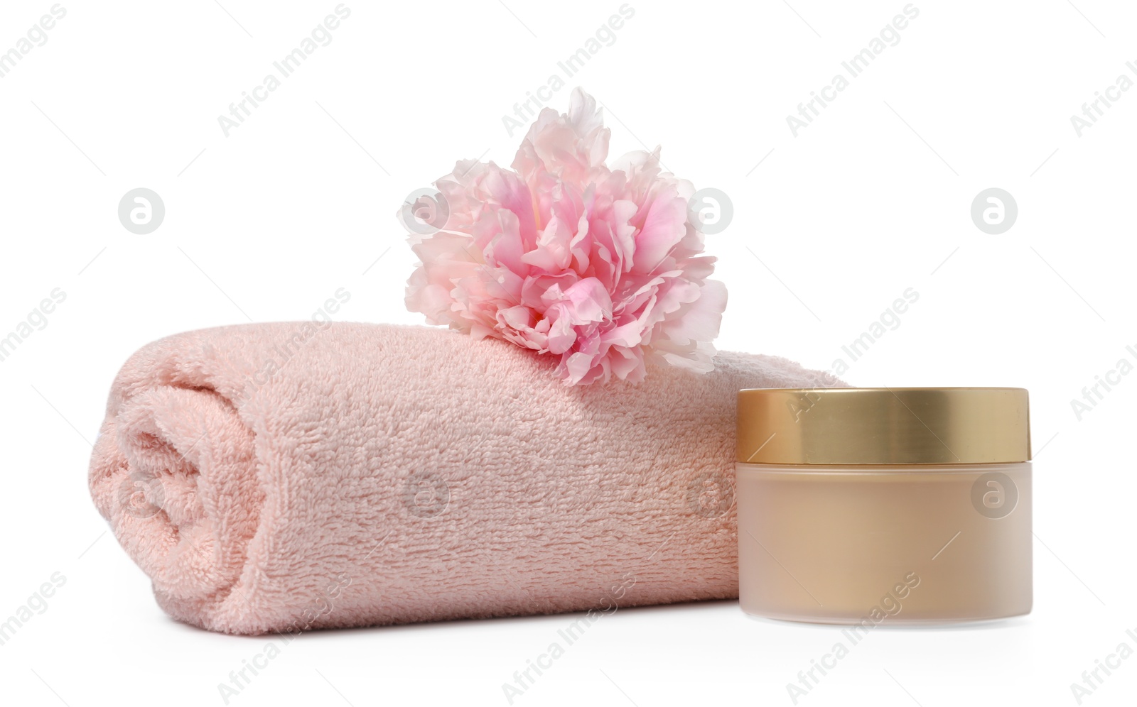 Photo of Soft towel, cosmetic product and peony flower isolated on white