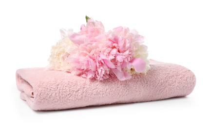 Photo of Soft towel and peony flowers isolated on white
