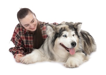 Photo of Woman with her beautiful Alaskan malamute dog on white background