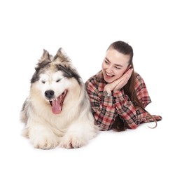 Photo of Woman with her beautiful Alaskan malamute dog on white background