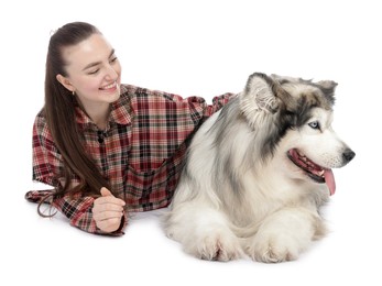 Photo of Woman with her beautiful Alaskan malamute dog on white background