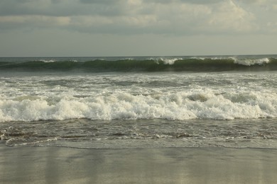 Photo of Beautiful sea and cloudy sky at tropical beach