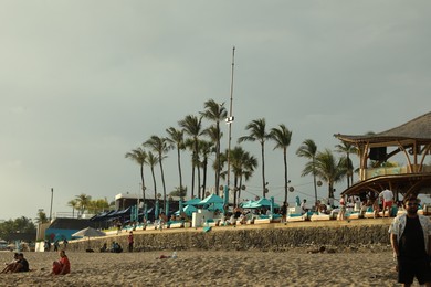 Photo of Bali, Indonesia - May 20, 2025: View of beach at tropical resort