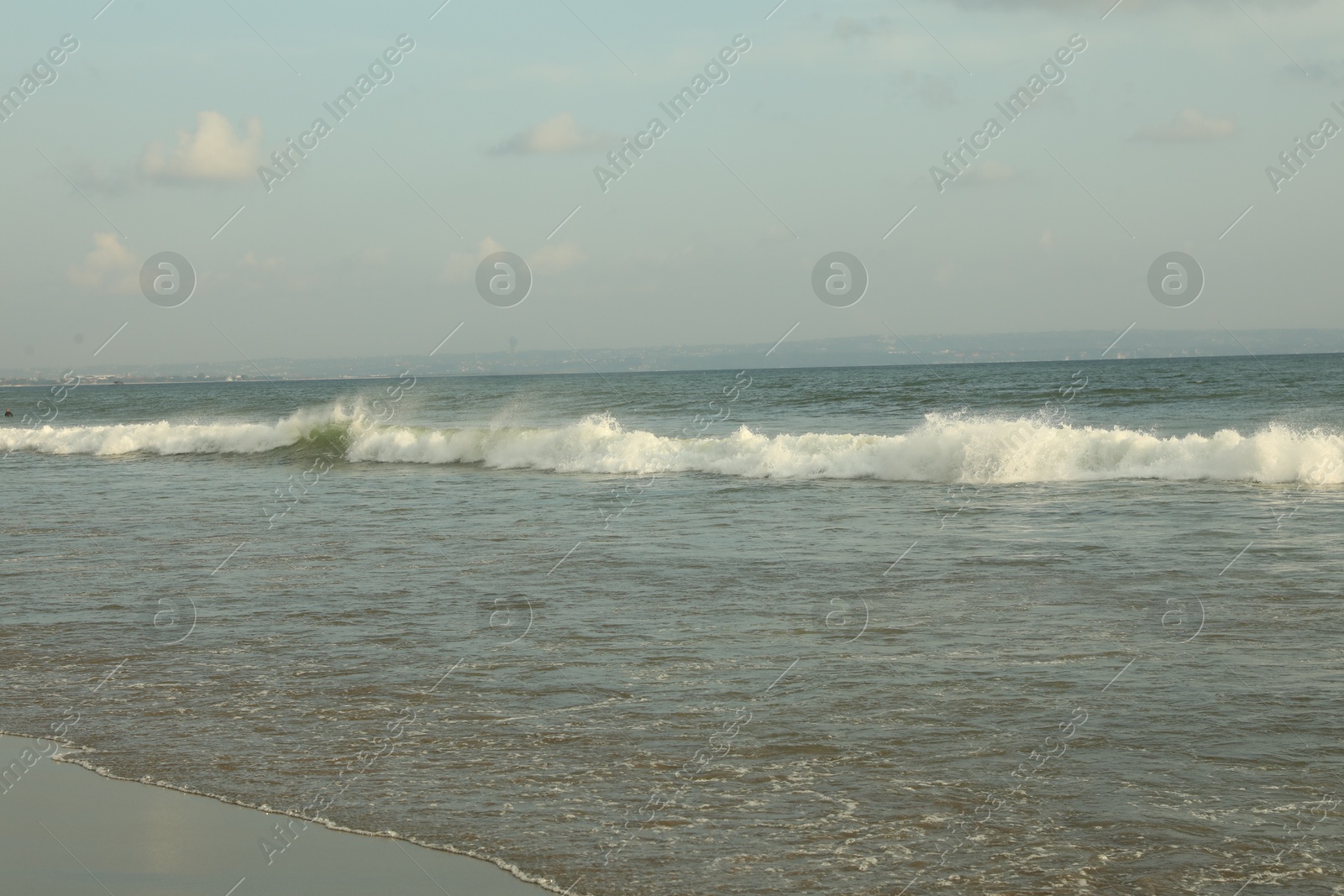 Beautiful sea and cloudy sky at tropical beach Photo of Beautiful sea and cloudy sky at tropical beach