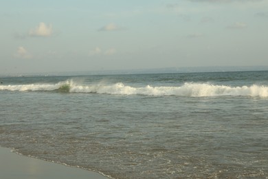 Photo of Beautiful sea and cloudy sky at tropical beach