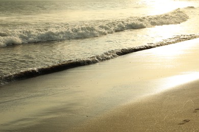 Photo of Beautiful sea and sandy beach at sunrise