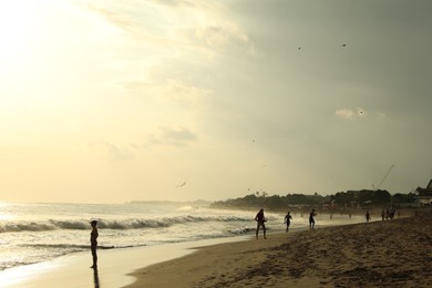 Photo of Bali, Indonesia - May 20, 2025: View of tropical beach at sunrise