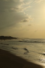 Photo of Beautiful sea and cloudy sky at sunrise