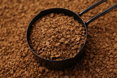 Photo of Scoop on aromatic granulated instant coffee, closeup view