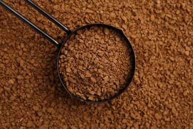 Photo of Scoop on aromatic granulated instant coffee, top view